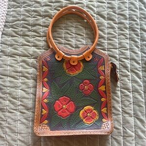 Printed tooled leather bag